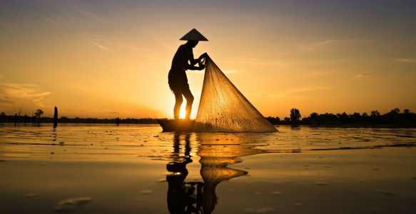 Reisebild - Fischer auf dem Mekong